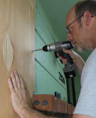 Installing Plywood Window Storm Shutters