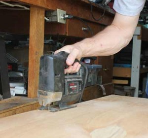 Installing plywood window storm shutters